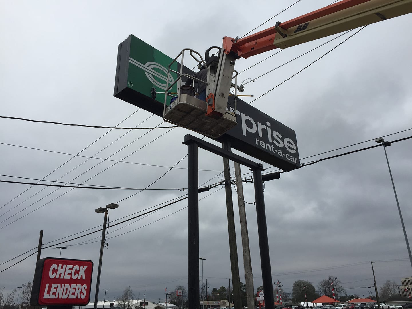 A business sign being installed in Louisiana