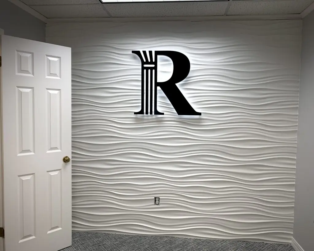 Law office interior lobby sign, dimensional logo sign with standoff and led halo lighting